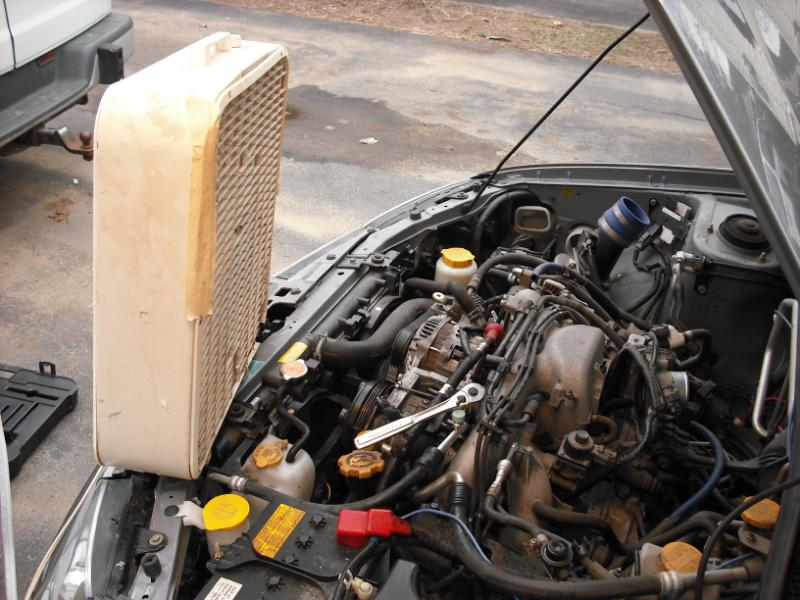 Illustration for article titled Garage Mechanic Ghetto-Rigs Subaru Impreza With Eaton Supercharger
